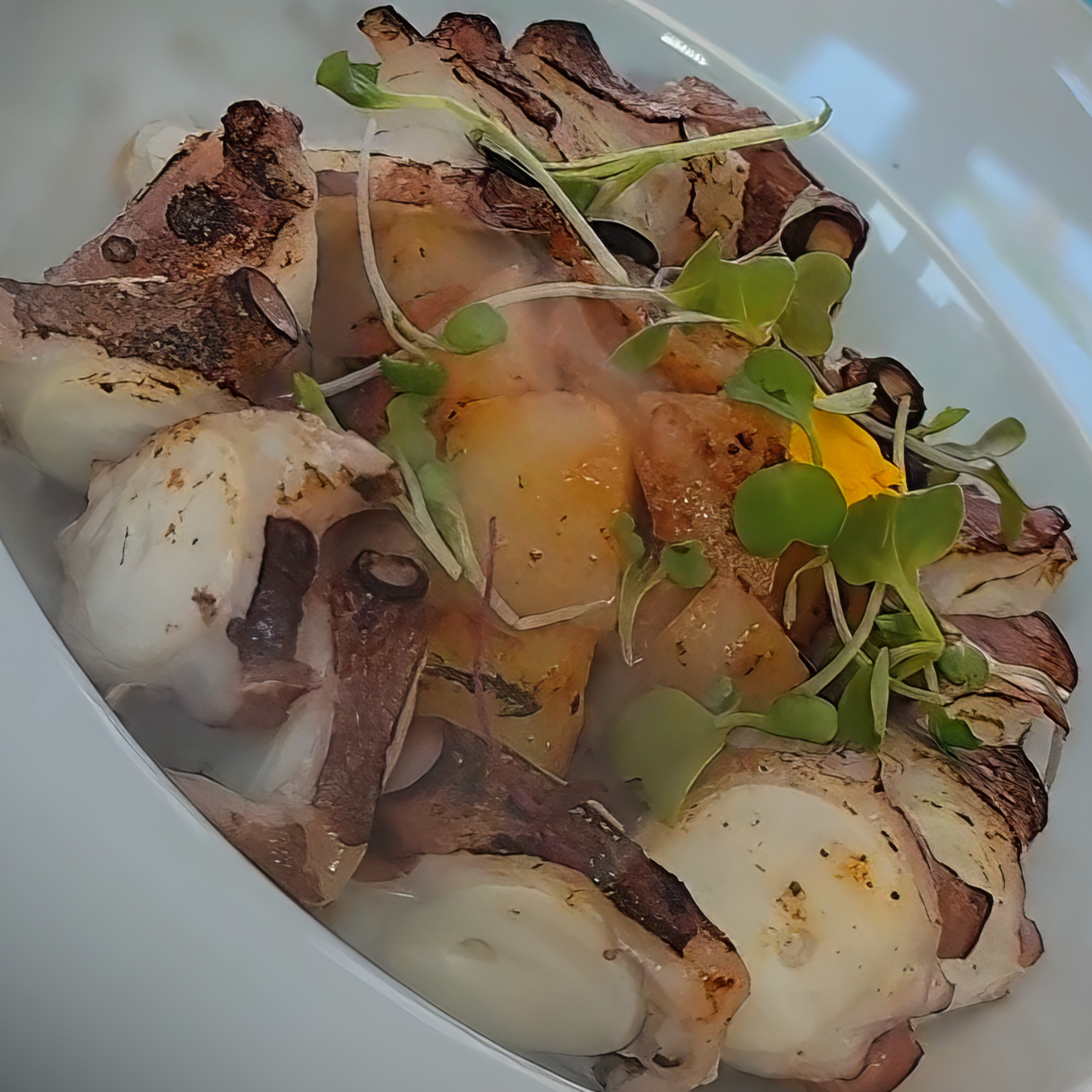 Pulpo Humo - Tender smoked octopus with Galician tradition